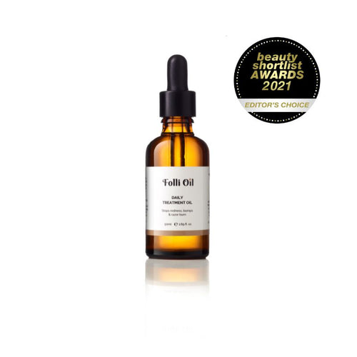 Bottle of Daily Treatment Oil on a white background – simple, natural skincare for calm, smooth skin with Beauty Shortlist Awards Editor's Choice certificate
